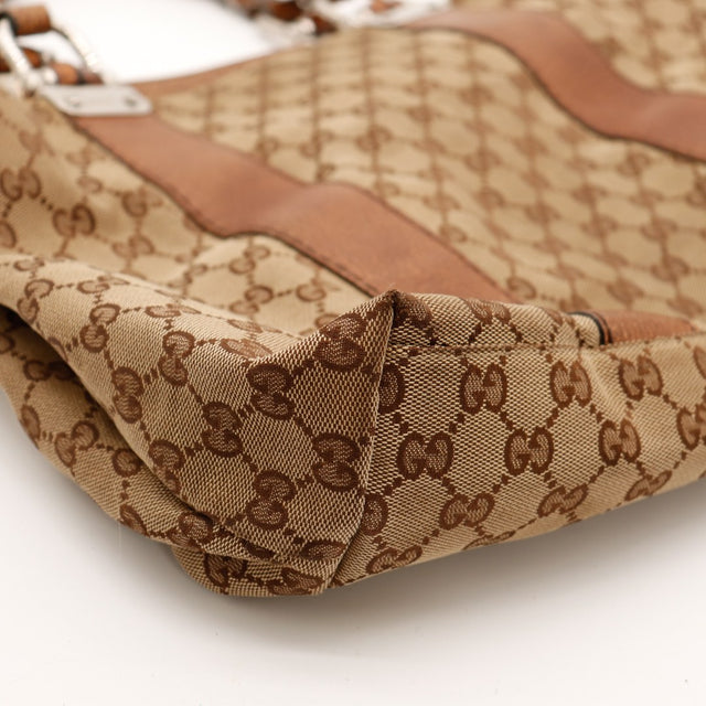 Détail coin toile monogrammée Gucci Tote Bag Bamboo occasion authentique — AMANA Vintage