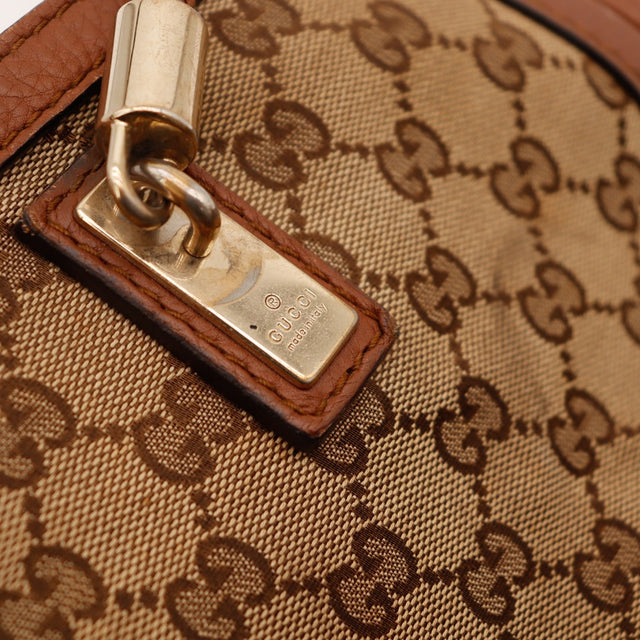 Détail plaque Gucci made in Italy occasion authentique — AMANA Vintage