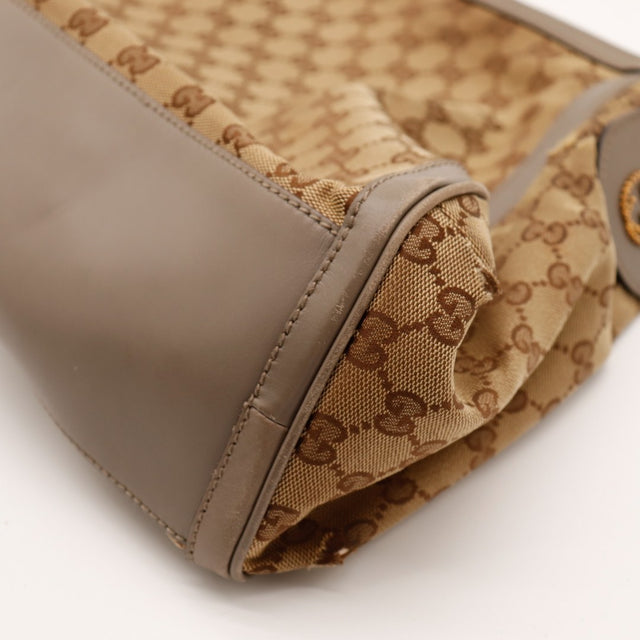 Détail base et toile monogrammée Gucci Hobo occasion authentique — AMANA Vintage