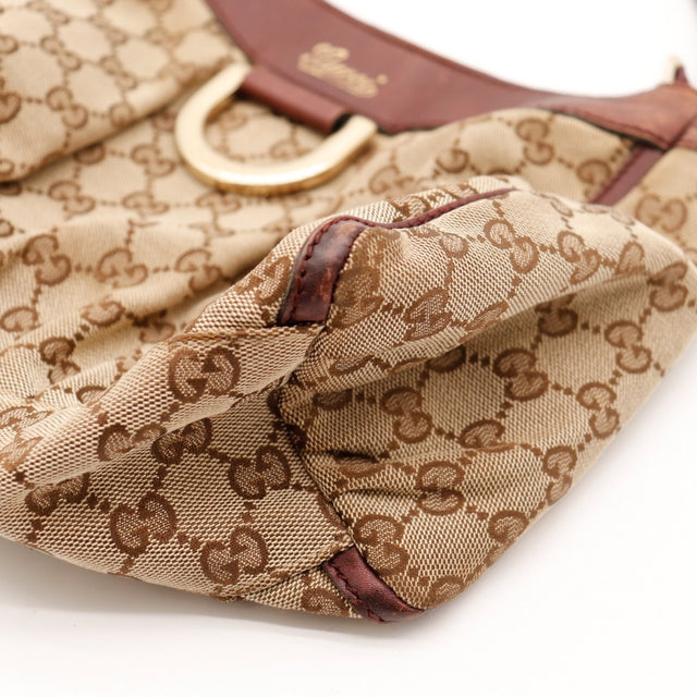 Détail bordure cuir et usure Gucci Hobo occasion authentique — AMANA Vintage