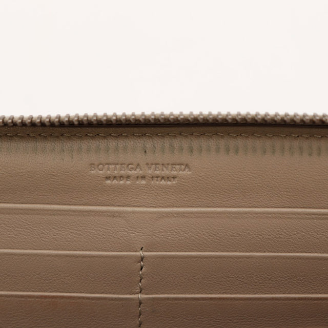Portefeuille Bottega Veneta cuir tressé kaki angle occasion authentique — AMANA Vintage