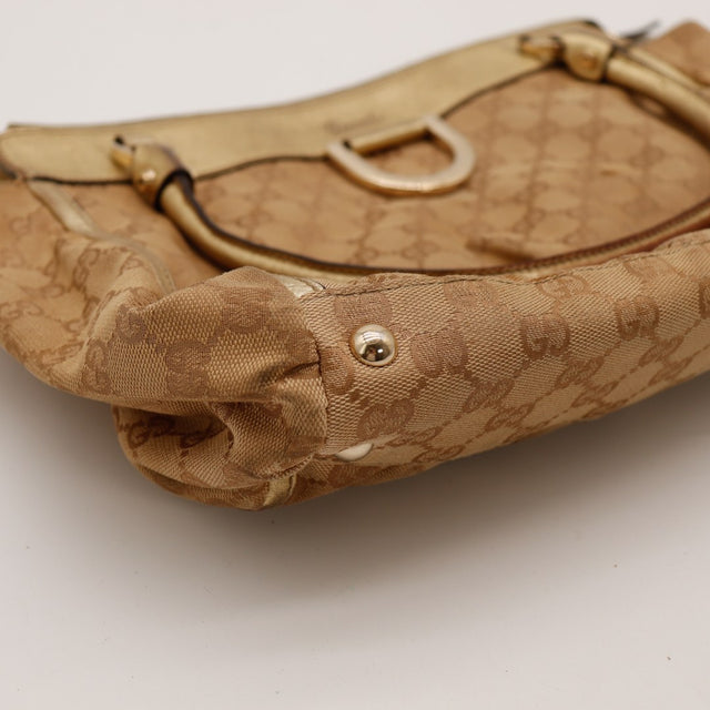 Détail coin inférieur toile monogrammée Gucci frottements — AMANA Vintage