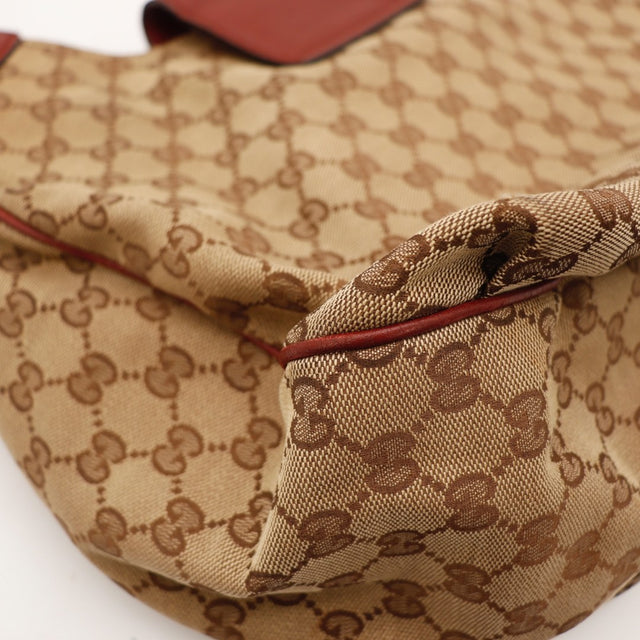 Détail de l'étiquette intérieure Gucci Hobo Dressage toile monogrammée occasion authentique — AMANA Vintage