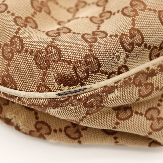 Détail bordure cuir et toile frottée Gucci Sukey — AMANA Vintage