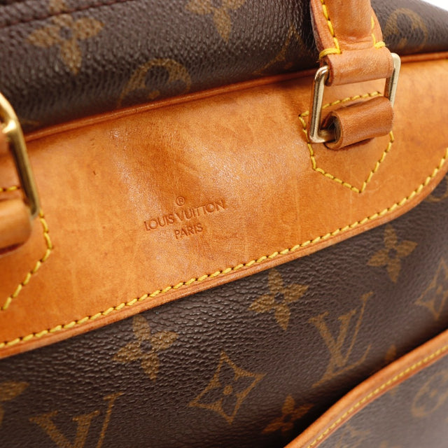 Détail du passepoil et de l'attache d'anse Louis Vuitton Deauville occasion authentique — AMANA Vintage