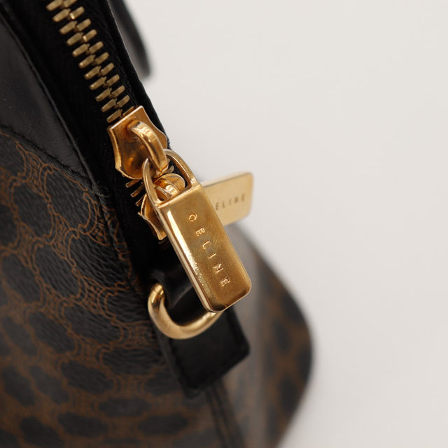 Détail tirette dorée signée Céline sur sac Macadam — AMANA Vintage