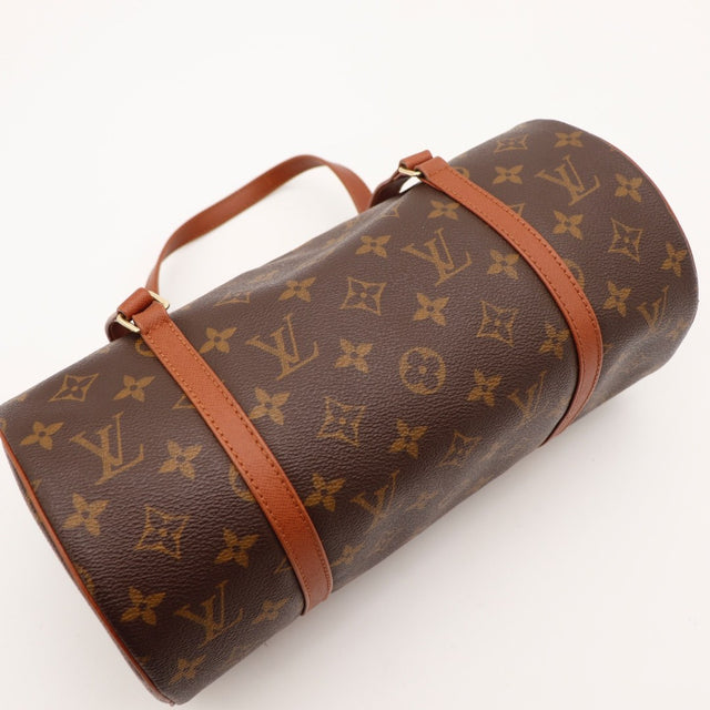 Vue de profil Louis Vuitton Papillon 30 Toile Monogramme occasion authentique — AMANA Vintage