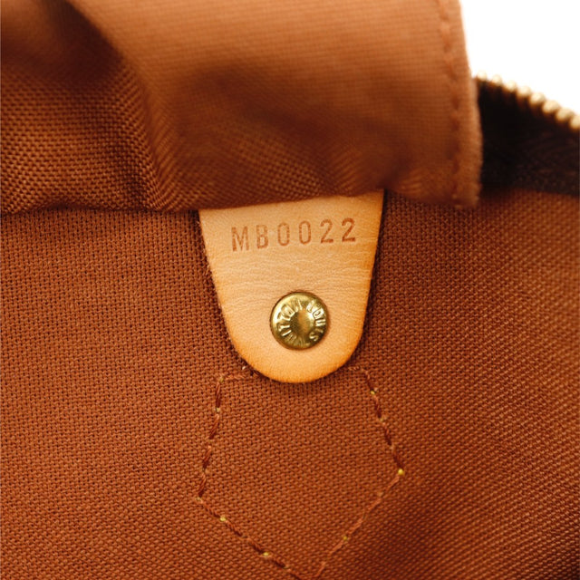 Détail des anses en cuir vachette Louis Vuitton Speedy 35 occasion authentique — AMANA Vintage