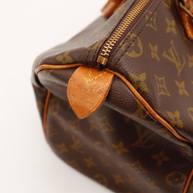 Détail des bordures en cuir Louis Vuitton Speedy 35 occasion authentique — AMANA Vintage