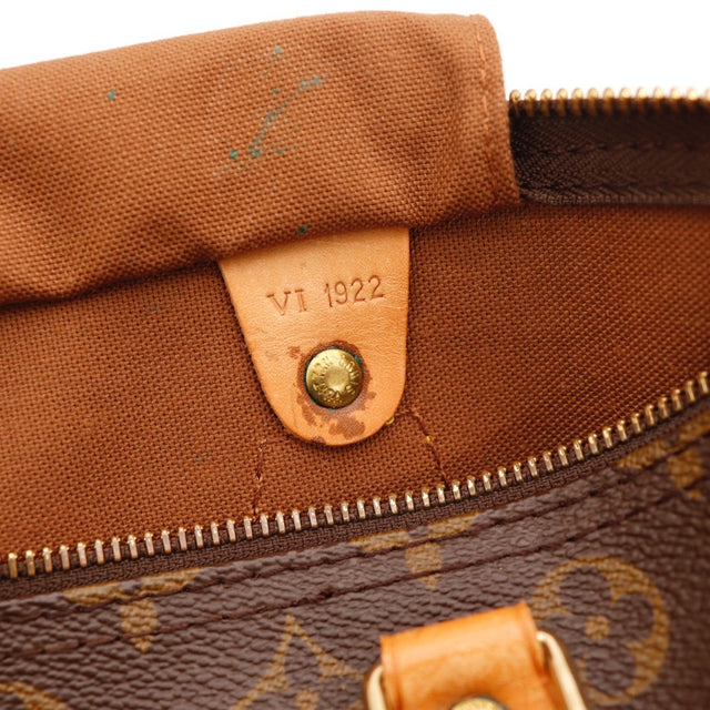 Détail des anses Louis Vuitton Speedy 30 Toile Monogramme occasion authentique — AMANA Vintage