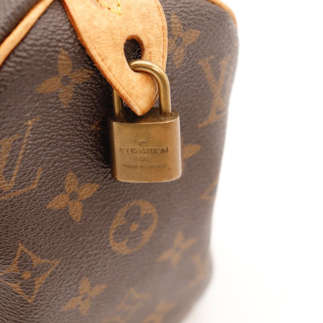 Détail des attaches d'anses Louis Vuitton Speedy 25 occasion authentique — AMANA Vintage