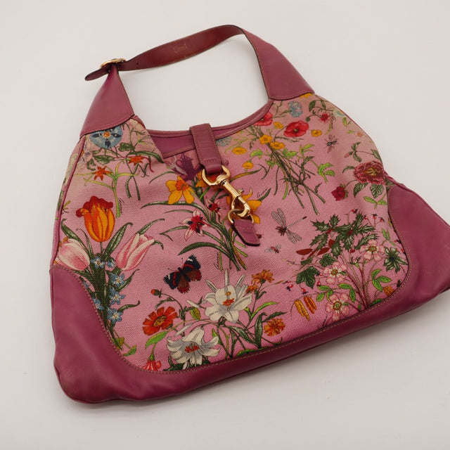 Détail du fermoir Gucci New Jackie toile Flora rose occasion authentique — AMANA Vintage