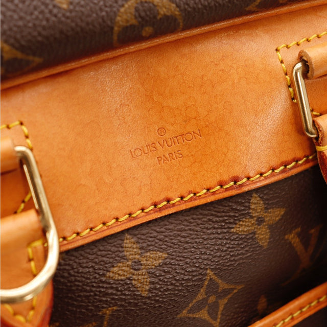 Détail des anses Louis Vuitton Deauville cuir vachette occasion authentique — AMANA Vintage