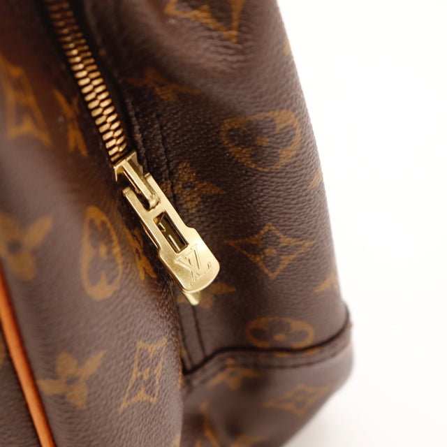 Détail de la poche extérieure Louis Vuitton Deauville Toile Monogramme occasion authentique — AMANA Vintage