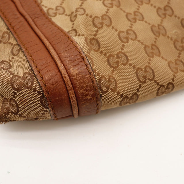 Détail des bordures Gucci Hobo cuir marron cognac occasion authentique — AMANA Vintage