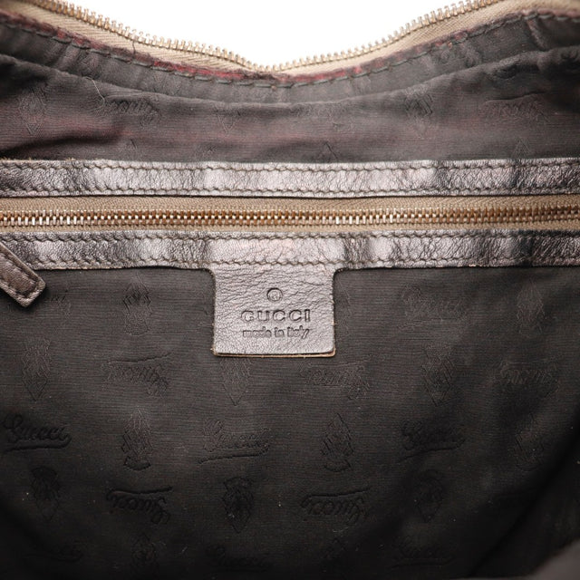 Détail des bordures Gucci Hobo Jockey Guccissima marron foncé occasion authentique — AMANA Vintage