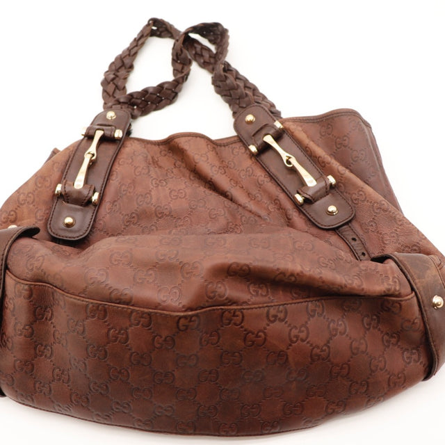 Détail des anses tressées Gucci Tote Pelham Guccissima marron occasion authentique — AMANA Vintage