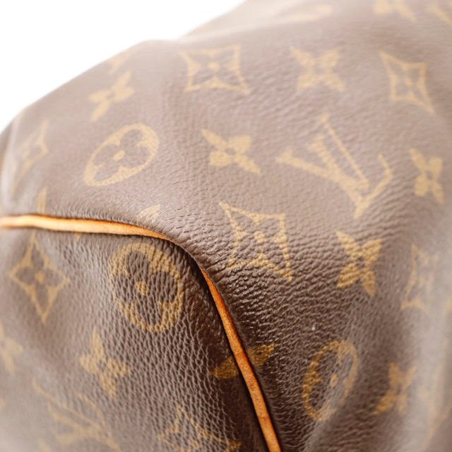 Détail du date code Louis Vuitton Speedy 35 Toile Monogramme occasion authentique — AMANA Vintage
