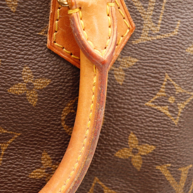 Détail du cadenas Louis Vuitton Speedy 25 Toile Monogramme occasion authentique — AMANA Vintage