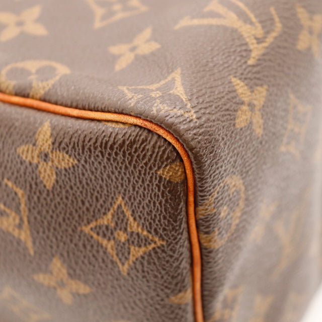 Détail du date code Louis Vuitton Speedy 25 Toile Monogramme occasion authentique — AMANA Vintage