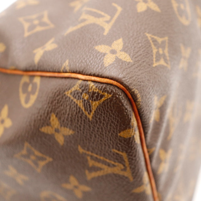 Détail du date code Louis Vuitton Speedy 30 Toile Monogramme occasion authentique — AMANA Vintage