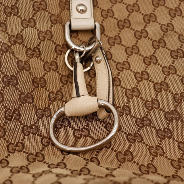 Détail anses cuir ivoire Tote Gucci vue rapprochée — AMANA Vintage