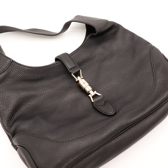 Détail fermoir piston argenté Gucci New Jackie cuir grené noir — AMANA Vintage