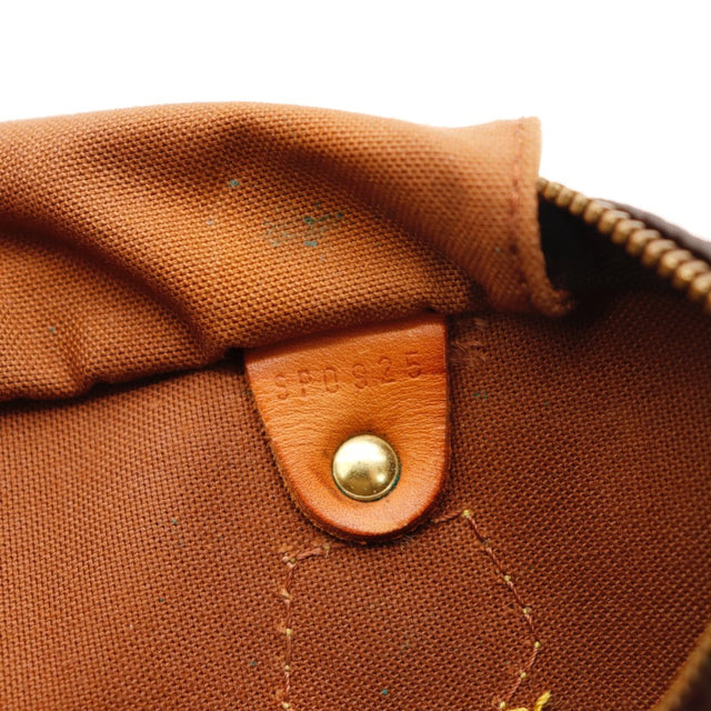 Détail du cuir vachette Louis Vuitton Speedy 30 Toile Monogramme occasion authentique — AMANA Vintage
