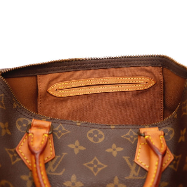 Détail des anses Louis Vuitton Speedy 30 Toile Monogramme occasion authentique — AMANA Vintage