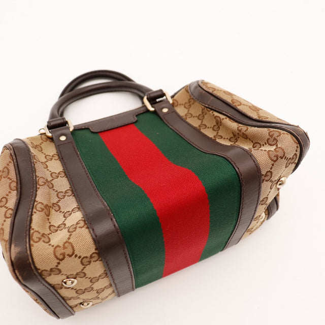 Détail coin inférieur sac Gucci Boston Joy Web frottements cuir marron — AMANA Vintage