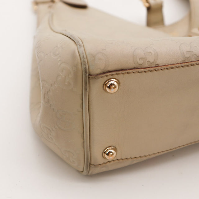 Détail coin inférieur Gucci New Jackie frottements cuir taupe — AMANA Vintage