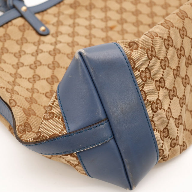 Détail coin inférieur gauche Tote Bag Bottega Veneta usure cuir bleu marine — AMANA Vintage