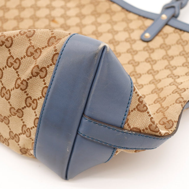 Macro toile monogrammée Bottega Veneta perforation visible — AMANA Vintage