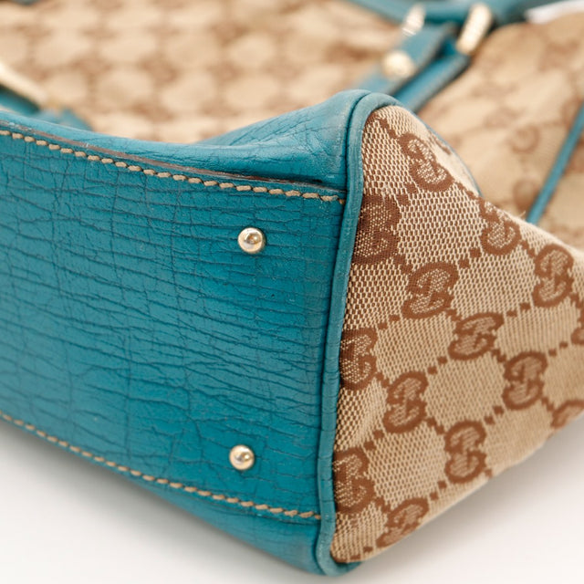 Détail coin cuir turquoise craquelé Gucci Tote Horsebit occasion — AMANA Vintage