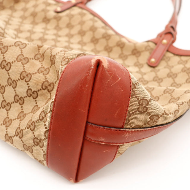 Détail canvas monogramme Gucci gros plan toile occasion — AMANA Vintage