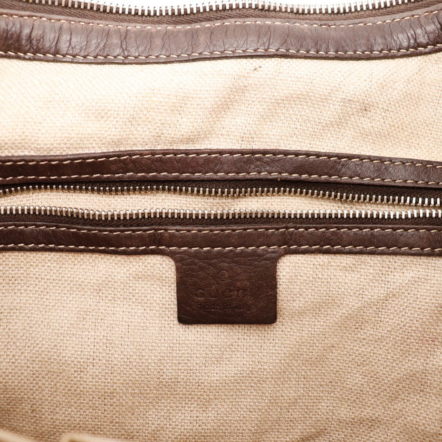 Détail intérieur Hobo Gucci doublure beige — AMANA Vintage