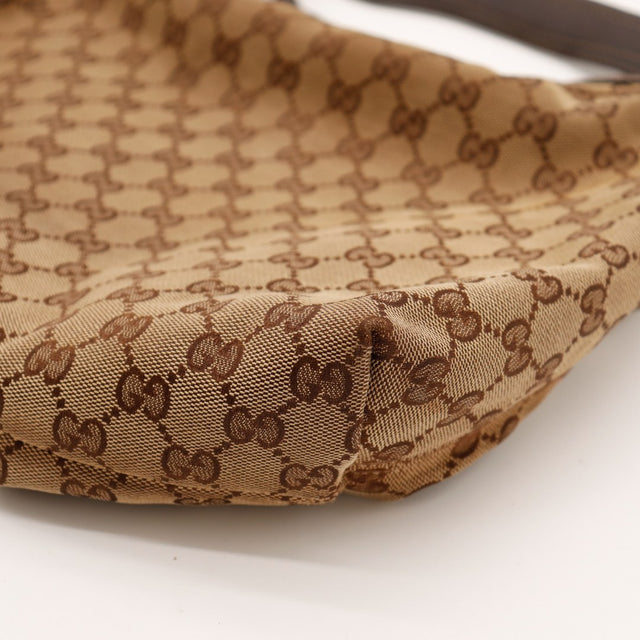 Détail fond Hobo Gucci toile monogrammée beige marron — AMANA Vintage