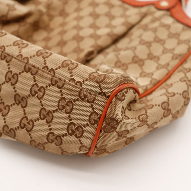 Détail accroc toile monogrammée sac Gucci Sukey — AMANA Vintage