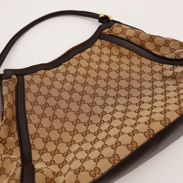 Détail toile monogrammée Gucci vue rapprochée occasion — AMANA Vintage