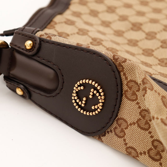 Détail médaillon Interlocking G doré Hobo Gucci occasion — AMANA Vintage