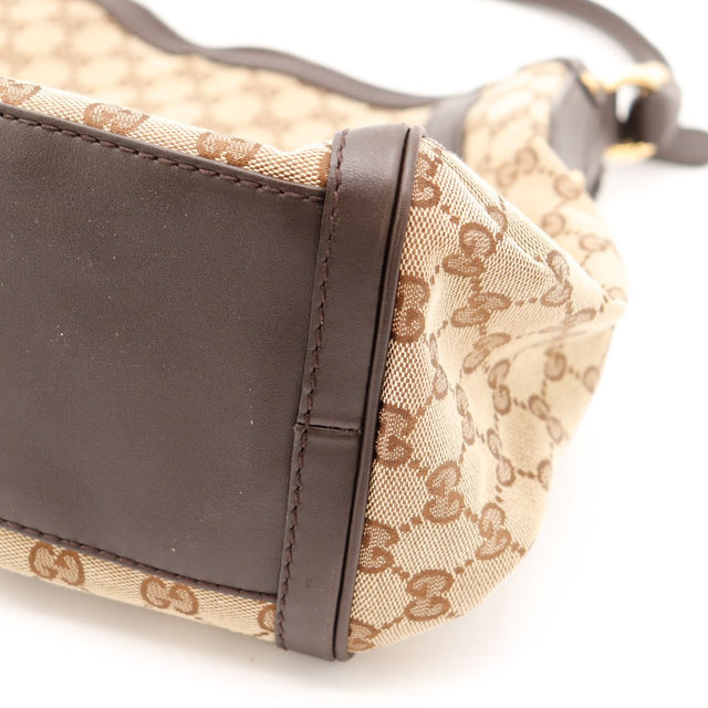 Détail coin inférieur droit Hobo Gucci cuir marron occasion — AMANA Vintage