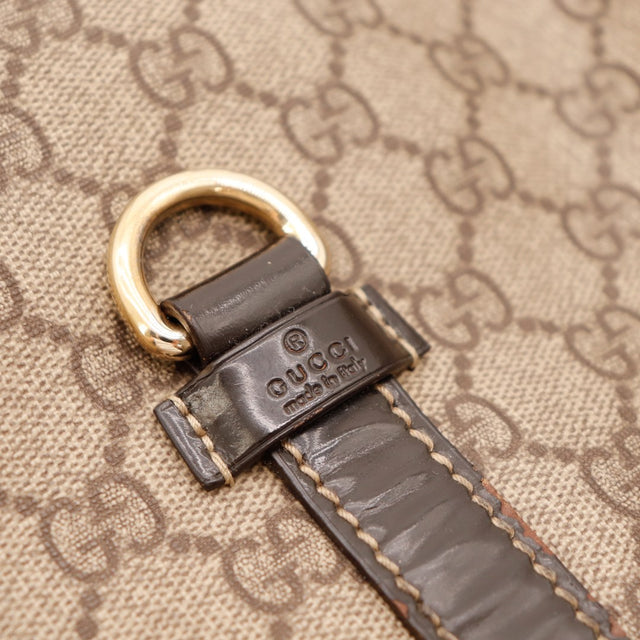 Détail anneau doré et cuir verni Gucci — AMANA Vintage