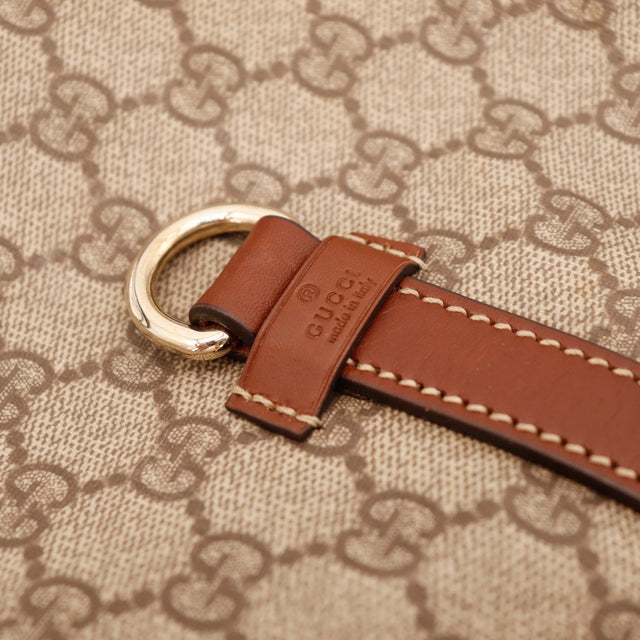 Détail attache cuir anneau doré Gucci Tote Horsebit — AMANA Vintage