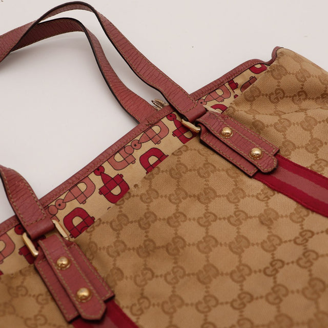 Détail canvas monogramme et bandes bordeaux Tote Bag Gucci — AMANA Vintage
