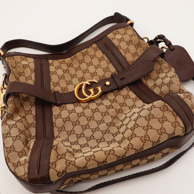 Intérieur doublure beige Gucci Hobo toile monogrammée occasion authentique — AMANA Vintage