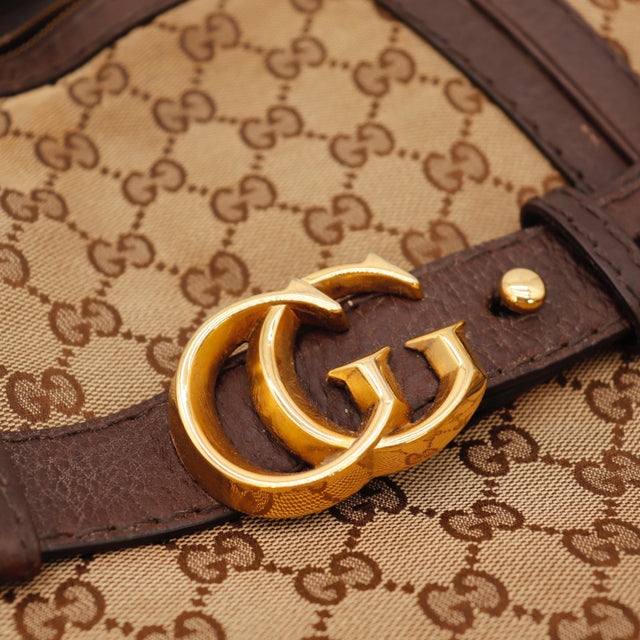 Détail de l'estampille Gucci Hobo toile monogrammée occasion authentique — AMANA Vintage