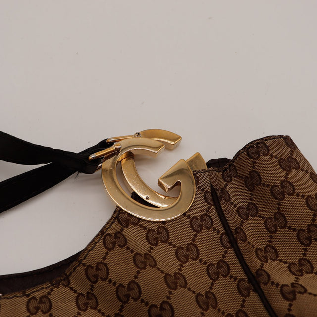 Détail fermoir signature Interlocking G doré Hobo Gucci — AMANA Vintage
