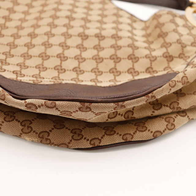 Détail bas droit Hobo Gucci toile monogrammée légères traces d'usage — AMANA Vintage