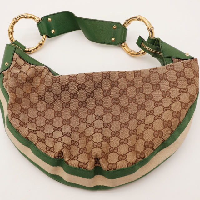 Détail de la bande Web verte et beige Gucci Hobo Bambou occasion authentique — AMANA Vintage