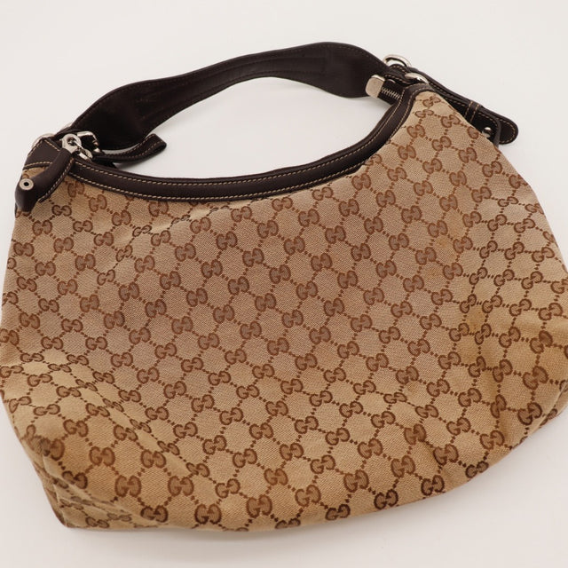 Détail de la fermeture zippée Gucci Hobo toile monogrammée occasion authentique — AMANA Vintage